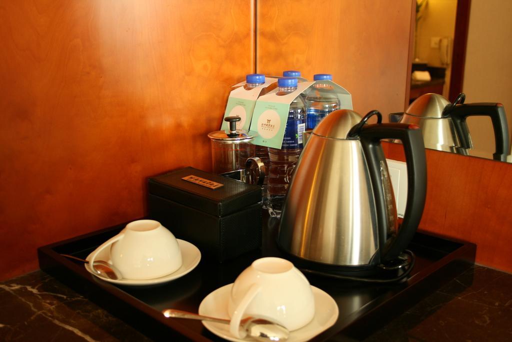 Merryland Traders Hotel Changshu Номер фото