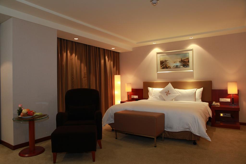 Merryland Traders Hotel Changshu Номер фото